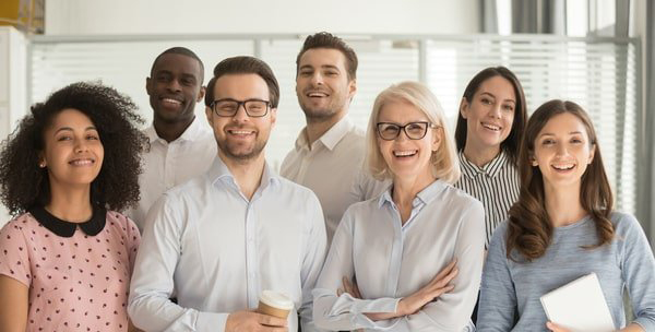 Group of smiling professionals excited to find career opportunities in healthcare