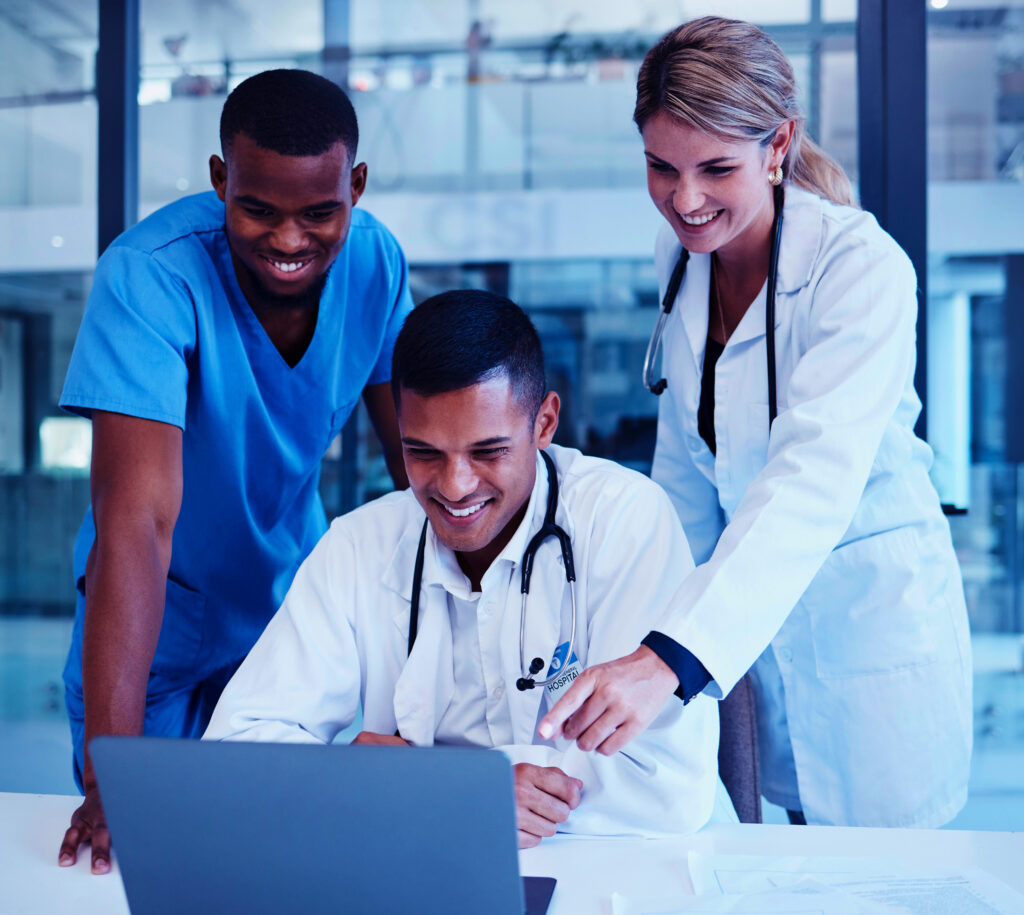 Diverse group of young healthcare professionals performing medical coding and Clinical Documentation Integrity (CDI).