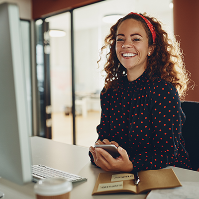 Smiling young woman excited to begin a new job in the healthcare field.